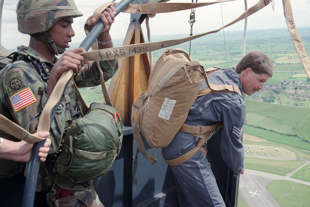 Paratroopers jumping together