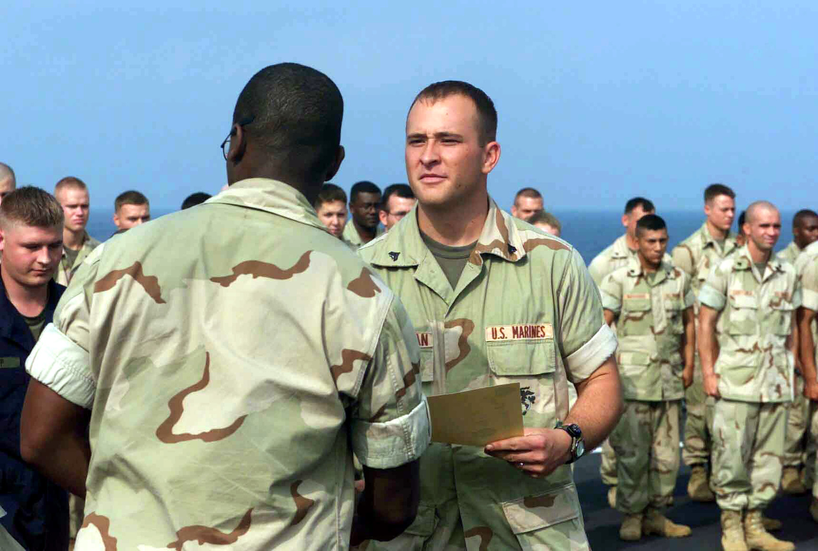 US Marines shaking hands. The Marine Corp is one of the most physically demanding branches