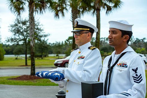 Air Force members honoring a veteran at his funeral