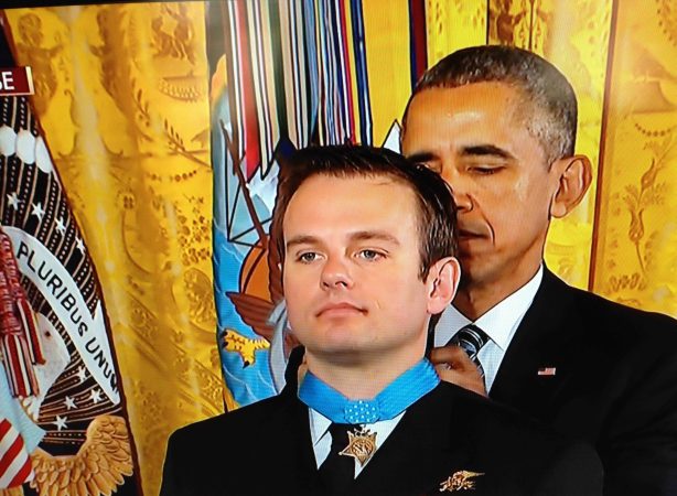 Navy SEAL comes out of the shadows just long enough to accept the Medal of Honor