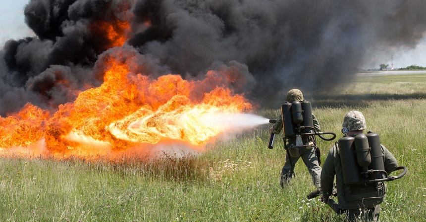 Why weapons like flamethrowers are permitted by the Geneva Convention