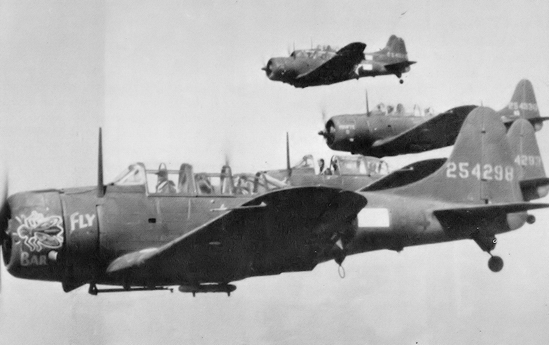 A-24B Banshees flying over Aleutian Islands.