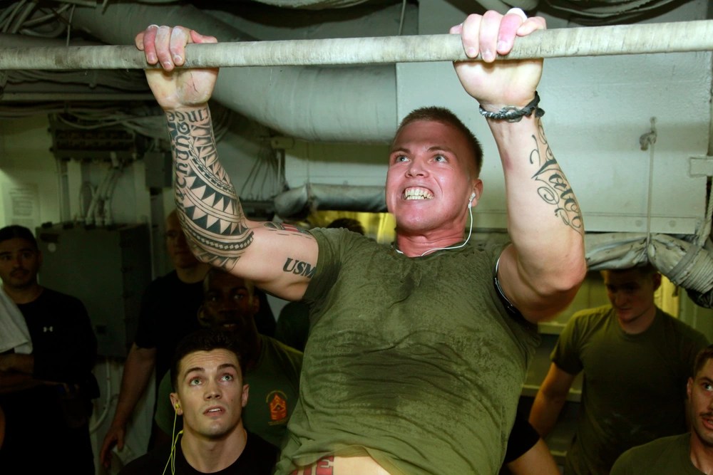 marine corps pull-ups on a ship