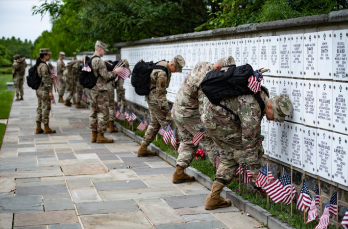 Old Guard soldiers place the flags at Arlington National Cemetery – Memorial Day 2022