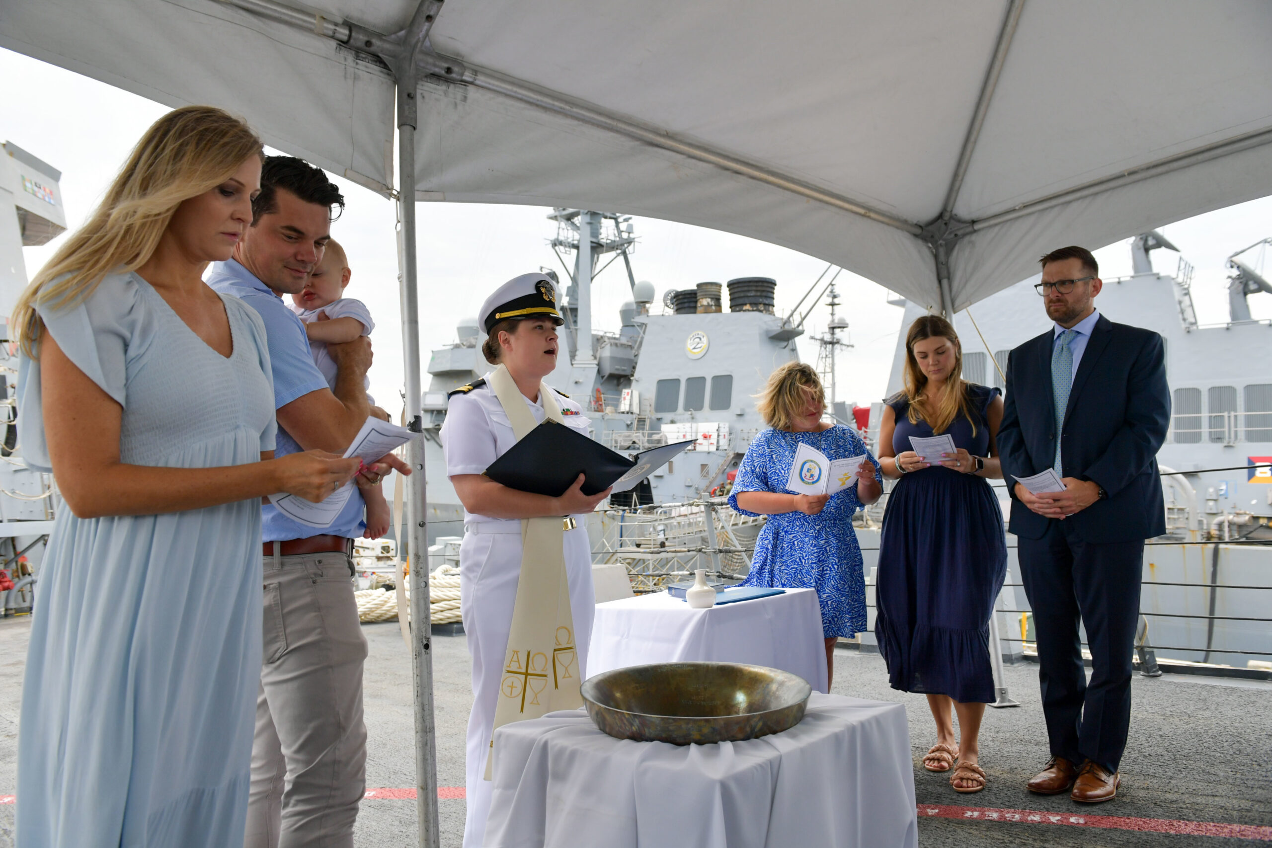 family baptized on ship