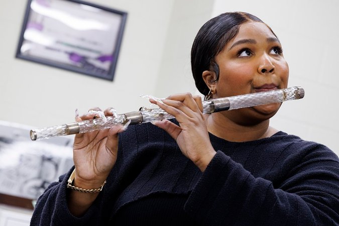 lizzo playing flute