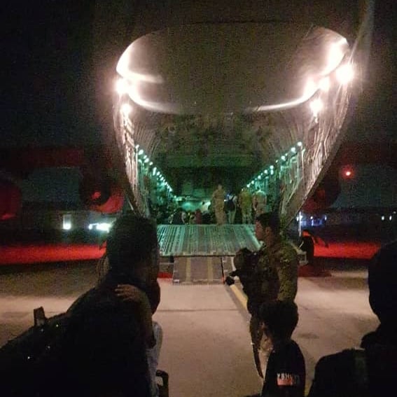 NRMG members on flight line