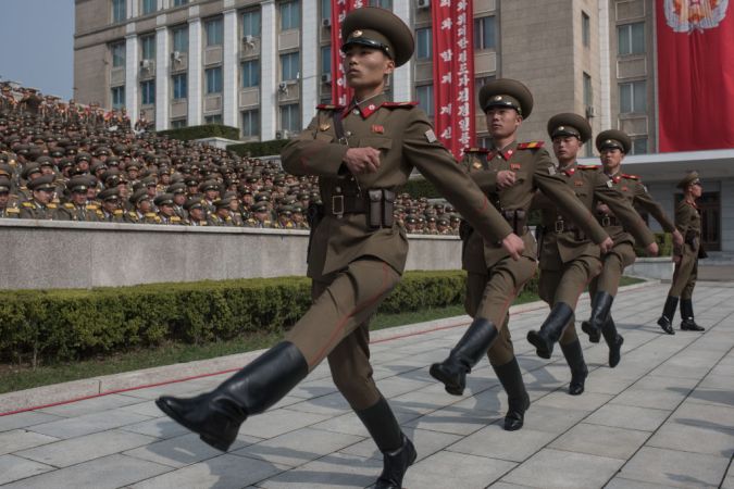 Why North Korean troops wear those ridiculous giant hats