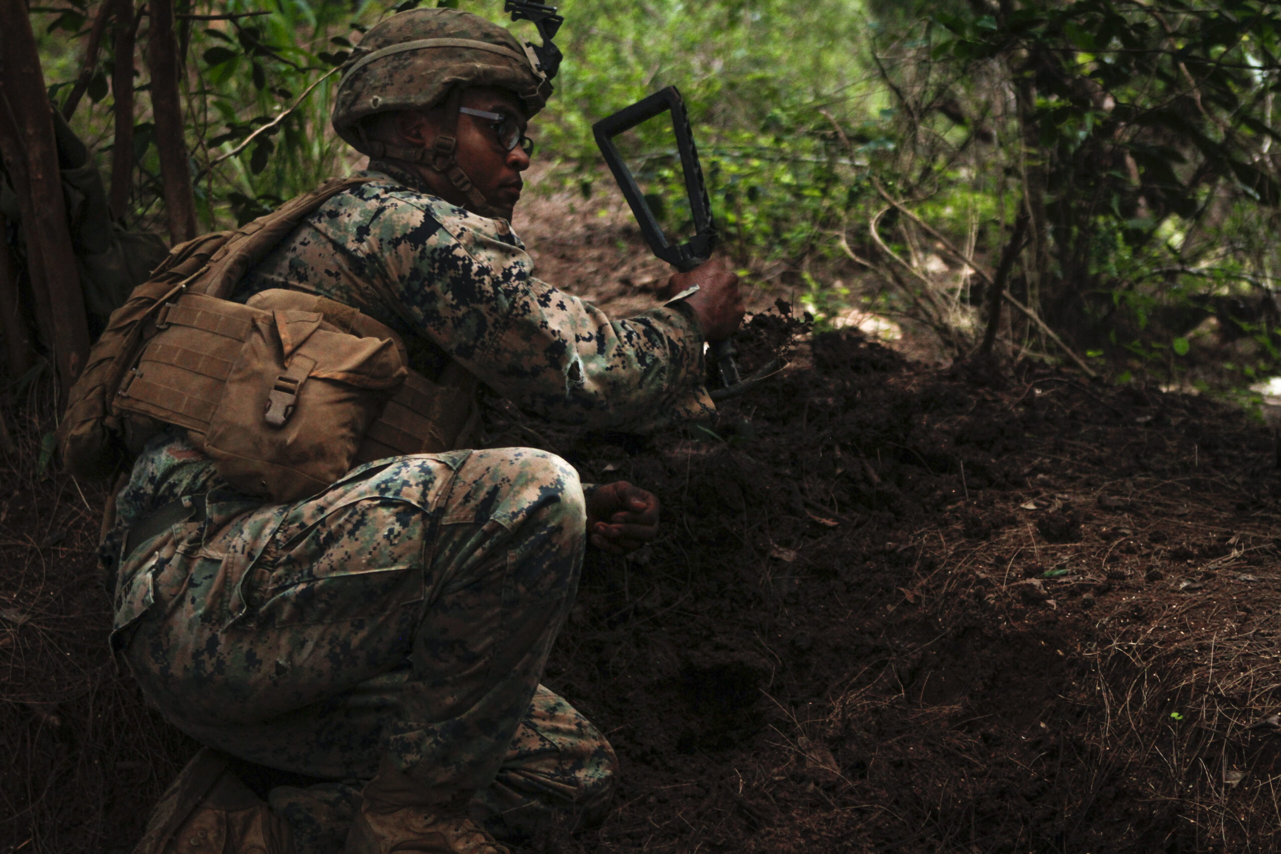 marine digging a foxhole