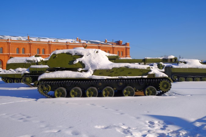 Russian military equipment covered in snow.