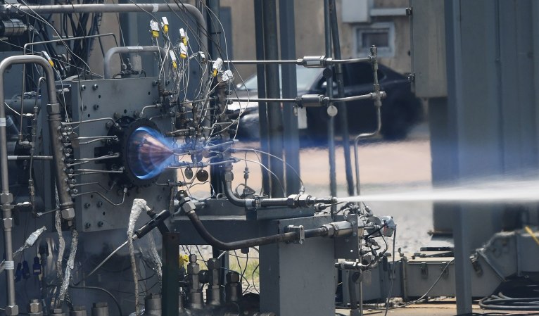 A prototype Rotating detonation engine under test at the Marshall Space Flight Center