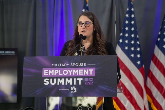 Brittany Hahn Boccher speaking at an event.