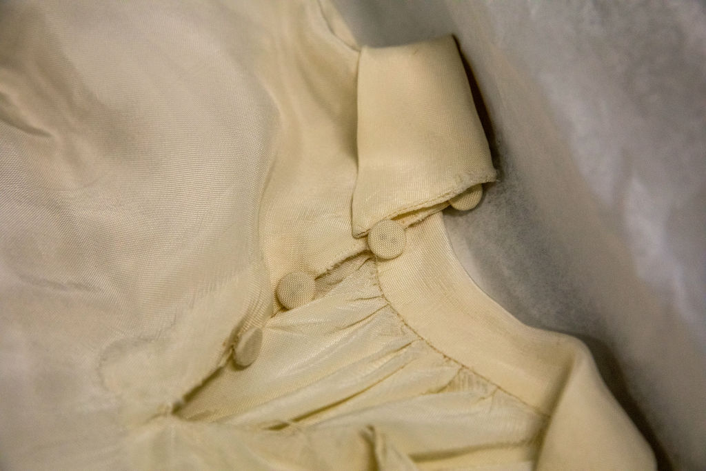 BOWIE, MD - MAY3: A wedding dress that was made just after World War II ended, from a parachute acquired by a young man for his betrothed who wanted to be married in white, was worn at a wedding in a displaced persons camp near Bergen-Belsen in Germany, and is now carefully stored at the U.S. Holocaust Memorial Museum's David and Fela Shapell Family Collections, Conservation and Research Center in Bowie, MD, May 3, 2017. The dress was worn by more than a dozen other brides in the displaced persons camp. The 80,000-square-foot Shapell Center is a state-of-the-art facility that will house the collection of record of the Holocaust, including historical artifacts, documents, photographs, film and other objects related to the Holocaust. (Photo by Evelyn Hockstein/For The Washington Post via Getty Images)