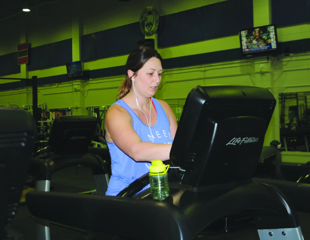 Amber Pirtle gets a good workout on one of the treadmills at Cantrell Fitness Center March 17.