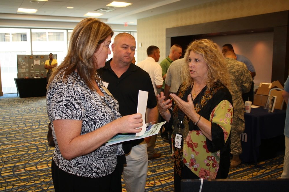 Jani McGee, a representative from Military OneSource speaks to the soldiers and family members of the 648th Maneuver Enhancement Brigade during a vendor break at the unit’s Yellow Ribbon event held over the weekend in downtown Atlanta. McGee also spoke at the event, sharing information on all of the services Military OneSource has available for deployed and returning soldiers and their family members.