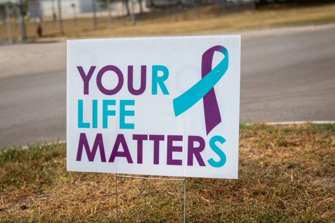 A sign reading "Your Life Matters" is seen at the entrance to the Nebraska National Guard air base in Lincoln, Nebraska, on Sept. 9, 2022. September is National Suicide Prevention Awareness Month and Sept. 10, 2022 is World Suicide Prevention Day. If you or someone you know is experiencing thoughts of suicide, know that you are not alone and that someone is always available to listen. Free and confidential support is available 24/7, 365 days a year with the National Veterans Crisis Line. Dial 988 then press 1 to get connected to a caring, qualified responder trained to support Veterans. The Veterans Crisis Line serves Veterans, service members, National Guard and Reserve members, and those who support them. You don’t have to be enrolled in VA benefits or health care to call. Help is available. Make the call today. (U.S. Army National Guard photo by Staff Sgt. Lisa Crawford)