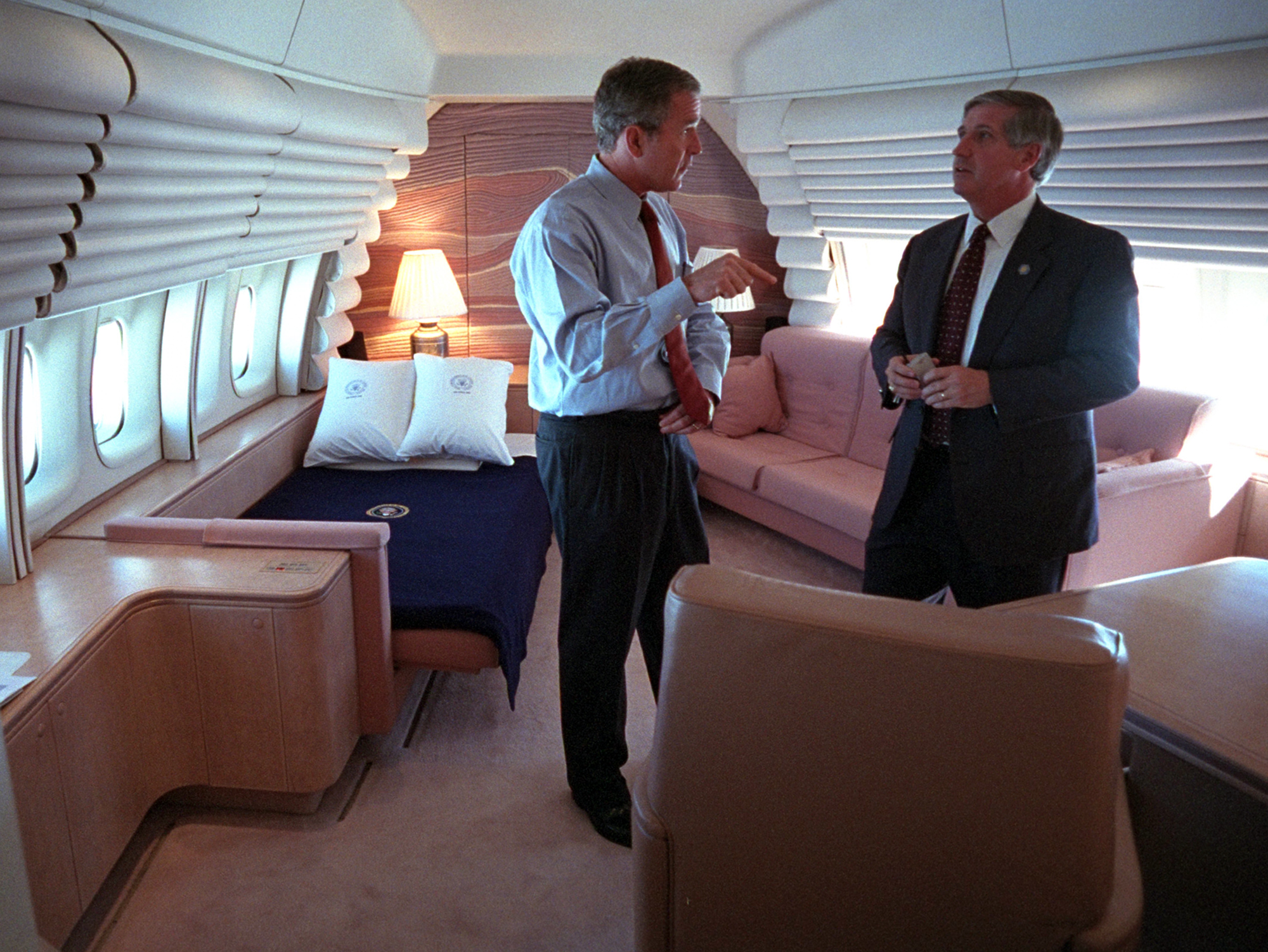 President George W. Bush confers with White House Chief of Staff Andy Card Tuesday, Sept. 11, 2001, in the President's stateroom aboard Air Force One. Photo by Eric Draper, Courtesy of the George W. Bush Presidential Library