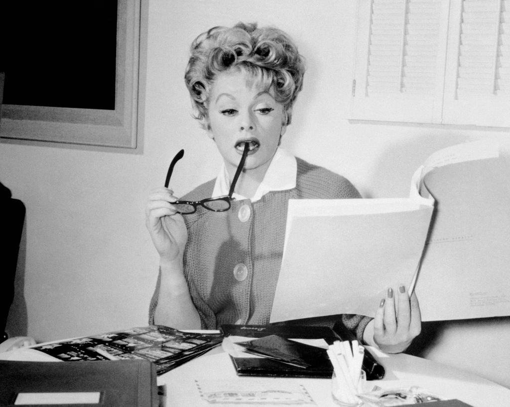 Lucille Ball (1911-1989), US comedian and actress, holding eyeglasses and script, circa 1960. (Photo by Silver Screen Collection/Getty Images)