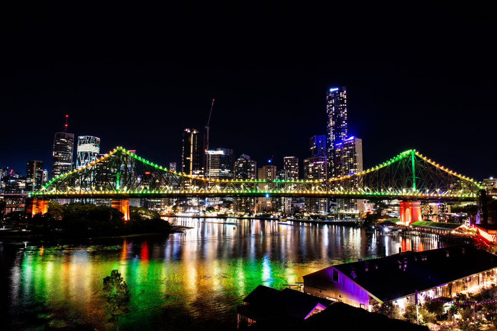 BRISBANE, AUSTRALIA - JULY 16: The Story Bridge is seen lit up in green and yellow lights during FIFA Women's World Cup 2023 'Unity Lights' event on July 16, 2022 in Brisbane, Australia. (Photo by Bradley Kanaris/Getty Images for FIFA)