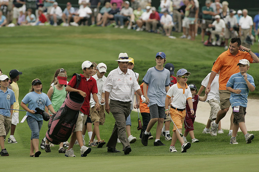 BLAINE, MN - AUGUST 5: Chi Chi Rodriguez brought a group of children onto the 18th hole during the final round of the 3M Championship August 5, 2007 at TPC Twin Cities in Blaine, Minnesota. (Photo by Michael Cohen/WireImage)