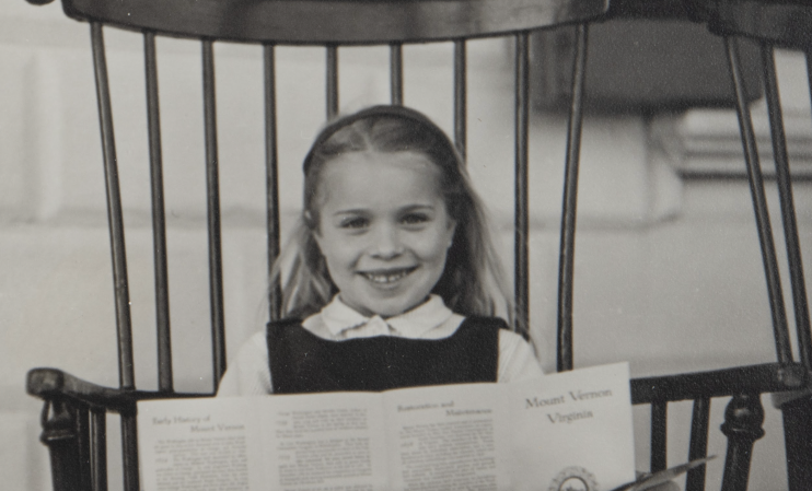 little girl in a rocking chair