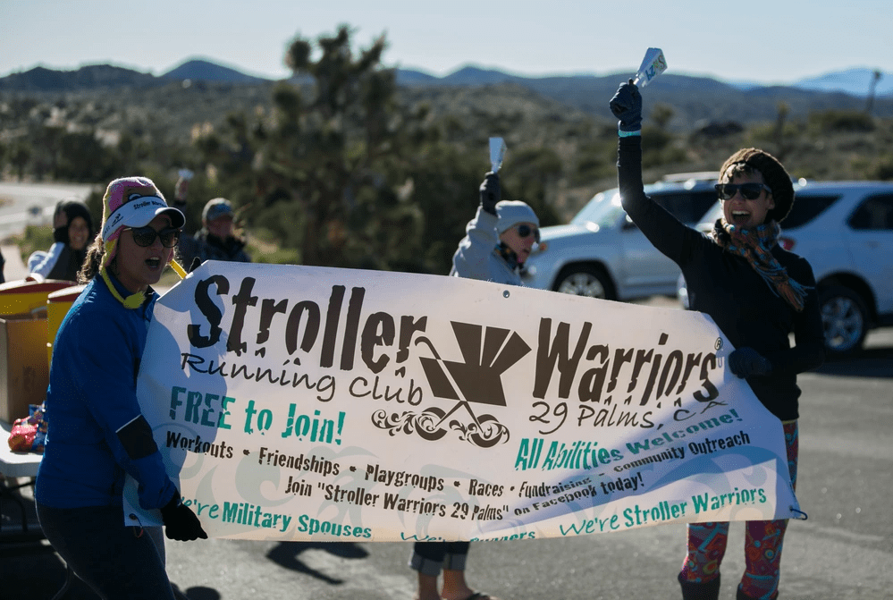 Stroller Warriors, a free running club for military spouses and their families, cheer on bike riders during the Park to Park Ride at the top of Keys View in Joshua Tree National Park, April 29, 2017. The event, hosted by Natural Resources and Environmental Affairs, Joshua Tree National Park and the city of Twentynine Palms, Calif. took riders from Knott’s Sky Park through Joshua Tree National Park to Keys View and back as the final event of Earth Day celebrations in the month of April. (U.S. Marine Corps photo by Cpl. Dave Flores)