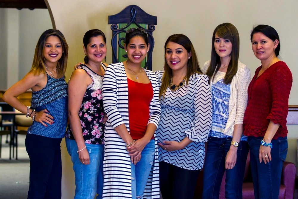 A group of Army wives poses for a picture during the Military Spouse Appreciation Day, May 8, 2015, at Fort Bliss, Texas. Military spouses made new friends during the event. (U.S. Army photo by: Sgt. Maricris C. Cosejo)