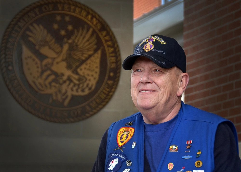 Steve Gebhart, a U.S. Army veteran and a Veterans Affairs volunteer at the Joint Ambulatory Care Center in Pensacola, Fla., is pleased to hear the news that veterans in the Pensacola region are now being encouraged to use Naval Hospital Pensacola for emergencies and inpatient care. The ability for veterans to use the Naval Hospital is not a new agreement between the local VA Clinic and the hospital, but encouraging veterans to use the hospital will benefit everyone. (VA photo by Thomas Coffelt)