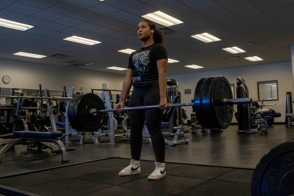 BUCKLEY SPACE FORCE BASE, Colo. – Airman Seana McCantes of the 460th Medical Group, executes a deadlift exercise inside the fitness center weight room at Buckley. The fitness center offers 24/7 access, group exercise classes, cardio rooms and a 4,600 square foot weight room, among other health and wellness services through the 460th Force Support Squadron. (U.S. Air Force photo by Craig Z. Rodarte)