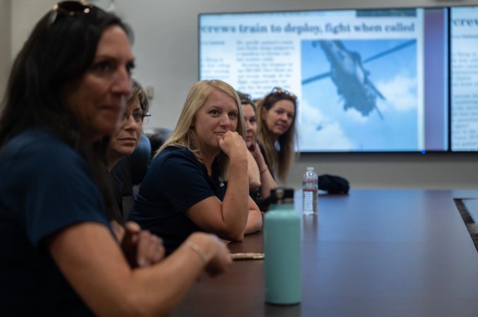 USAA senior executives attend a mission brief at Davis-Monthan Air Force Base, Ariz., June 22, 2023. The executives learned about the units located on base and how they come together to execute our mission of rescue and attack. (U.S. Air Force photo by Airman 1st Class Jasmyne Bridgers-Matos)