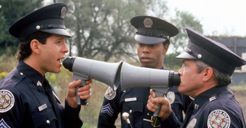 officers yelling in backwards megaphone