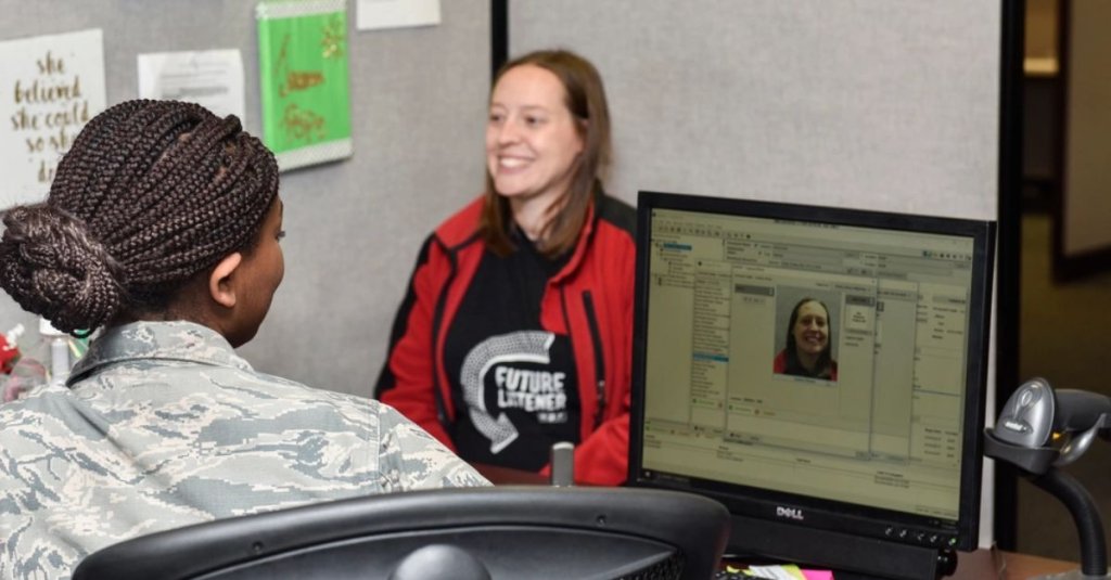 Dr. Nan Pond gets her picture taken for a new ID by Airman 1st Class Jacara Pope, 377th FSS customer service technician, at Kirtland Air Force Base, N.M., Jan. 15, 2019. Kirtland’s MPF work also includes making ID cards for service members, contractors, dependents and retirees, DEERS updates such as new dependencies and marriages, leave approval, line of duty determinations, special leave accrual, on base transportation, resetting common access cards and helping dependents gain U.S. citizenship. (U.S. Air Force photo by Airman 1st Class Austin J. Prisbrey)