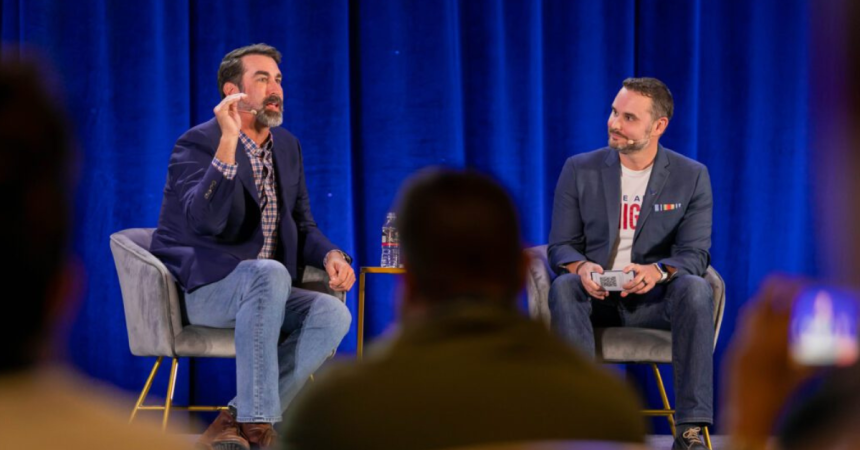 Rob Riggle and Mark Harper on stage at the Military Influencer Conference. Photo courtesy of MIC.