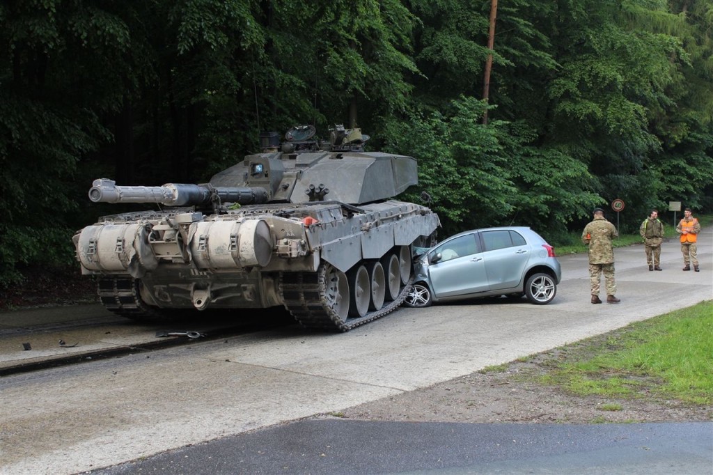 Toyota Yaris plays chicken with 68-ton tank, loses