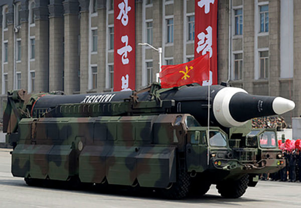 North Korea says new missile can carry heavy nuke