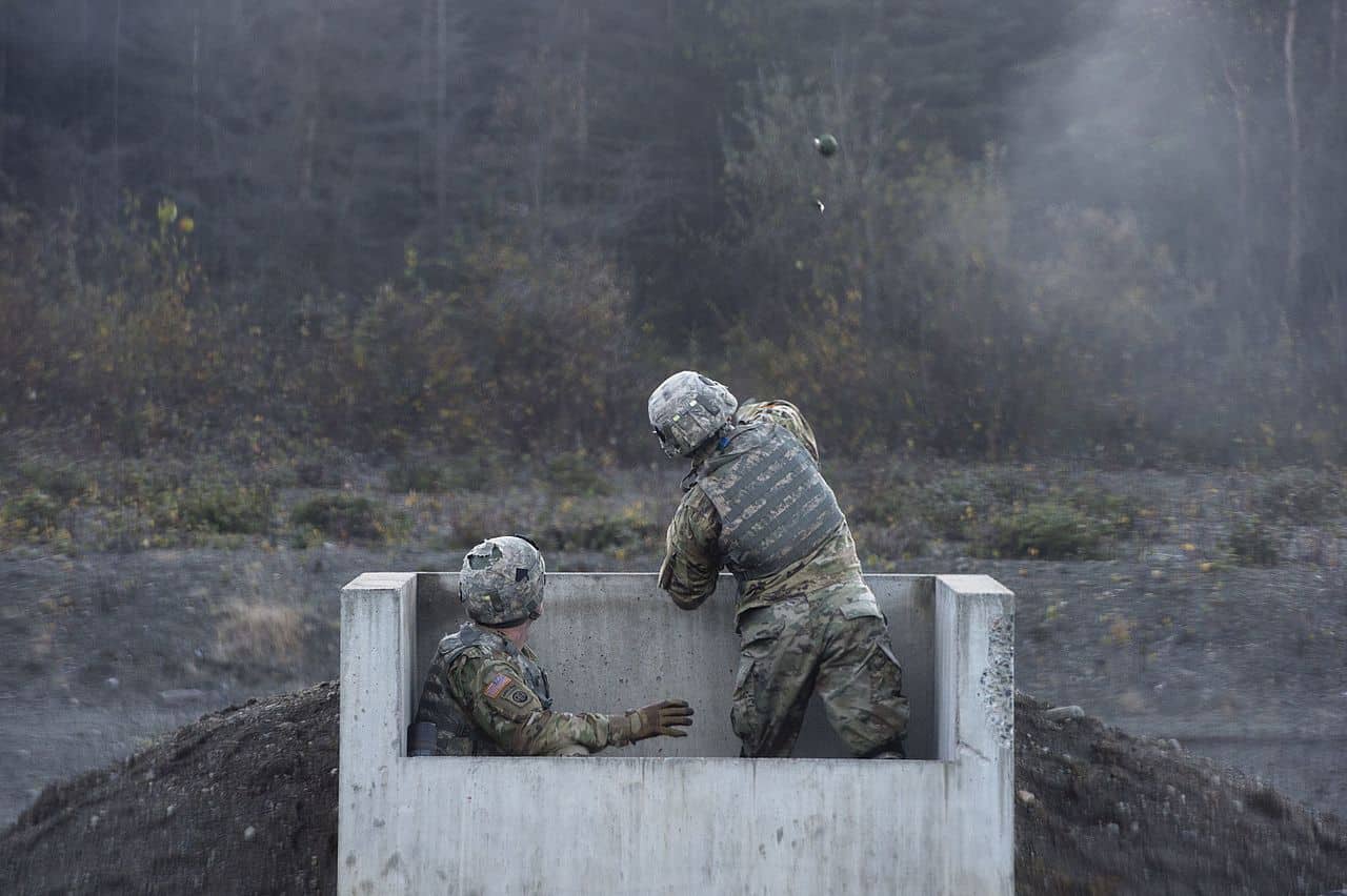 Army Spc. throwing a grenade