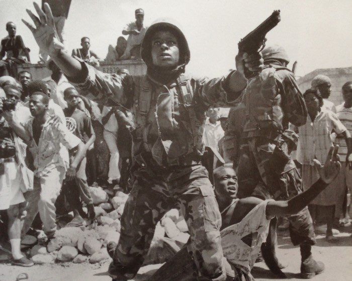 1995 - American Marine trying to keep Haitian rioters at bay during unrest