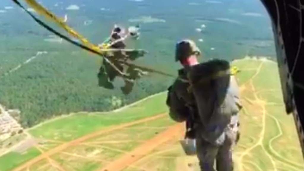 Here’s what it looks like when paratroopers jump out of a helicopter