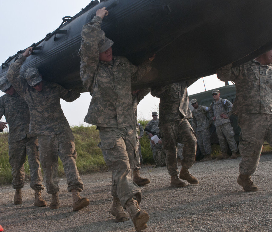 sappers carrying boats