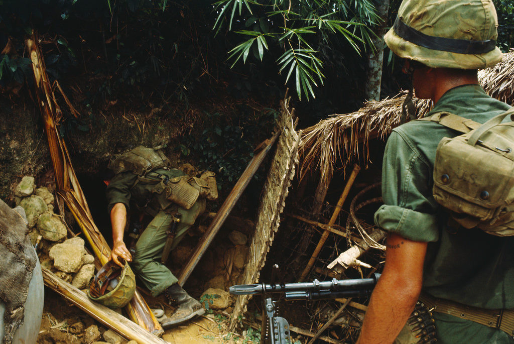 marines search Viet Cong tunnels