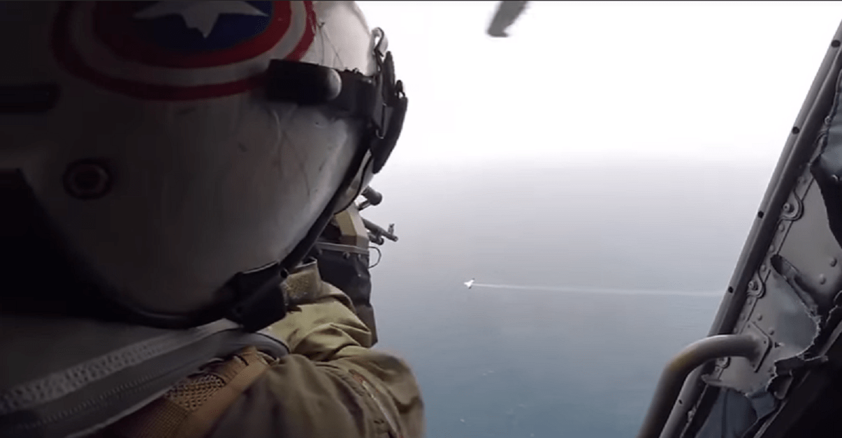 Watch this helicopter door gunner shoot down a drone