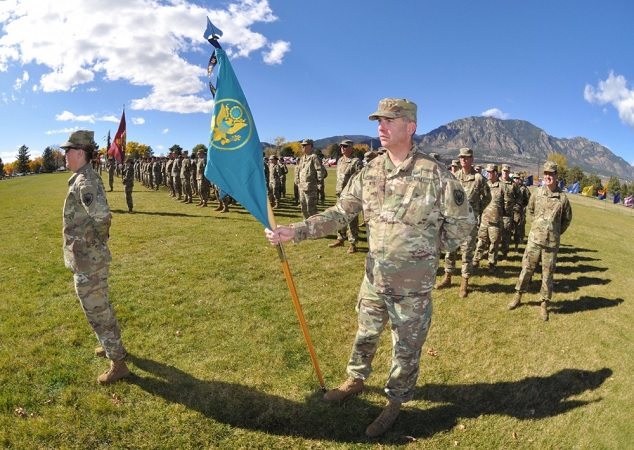 military formation with mustang officers