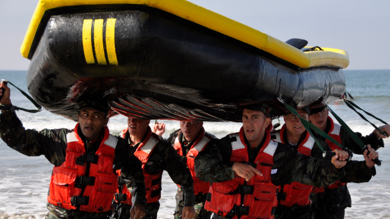 Students in BUD/S training class 279 participate in a surf passage exercise during the first phase of training at Naval Amphibious Base Coronado.

(Photo by MC2 Kyle D. Gahlau)