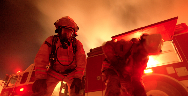 Firefighters working together, demonstrating the importance of camaraderie