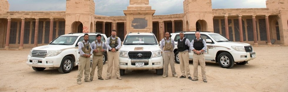 Law enforcement officials demonstrating brotherly camaraderie in their work