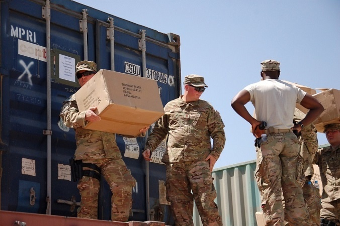 Soldiers with higher rank lending a hand