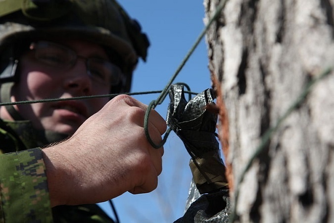 Man hanging by paracord