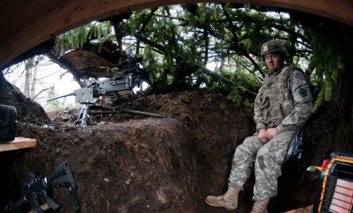 soldier in fighting holes